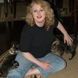 Certified Cat Behaviorist Rita with her cats Trouble and SweetPea Certified Cat Behaviorist Rita with her cats Trouble and SweetPea